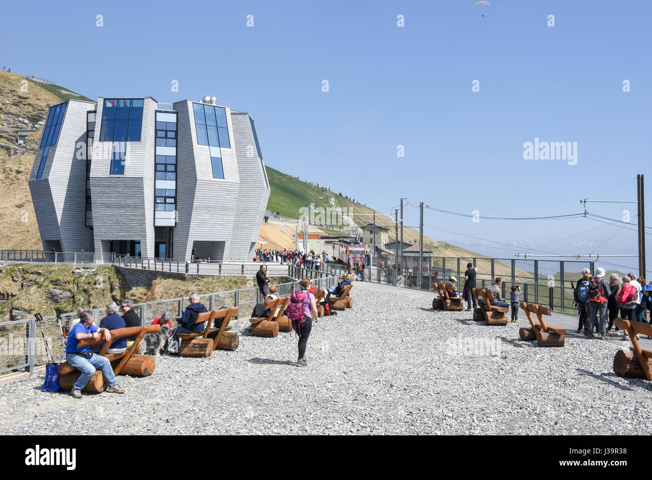 monte generoso, switzerland - 8 april 2017: tourists walking and monte generoso, switzerland - 8 april 2017: tourists walking and