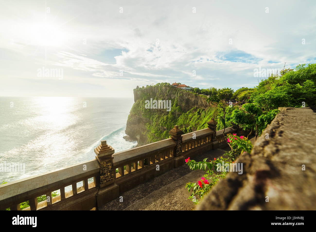 Scenic Landscape Of High Cliff With Sunset Sky At Uluwatu Temple Bali