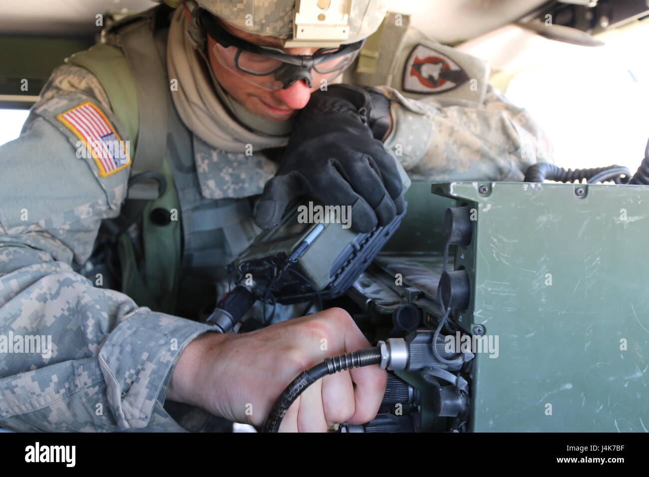 Spc. Tailor Riskowski, a signal support systems specialist with the