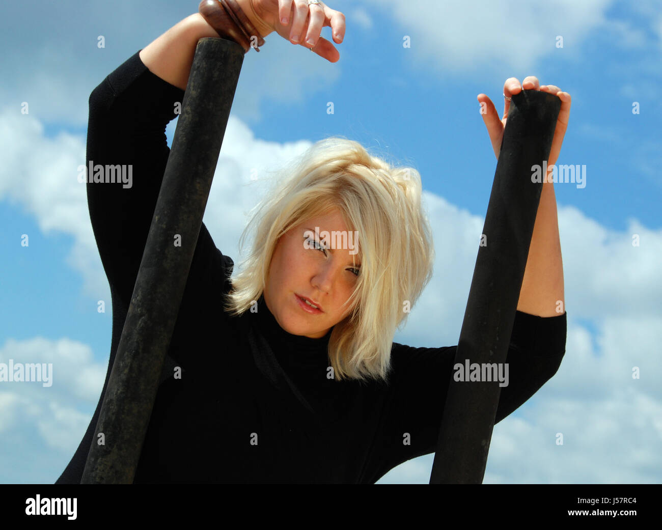 Beautiful Blonde Girl Outdoors Wearing A Black Outfit Stock Photo Alamy