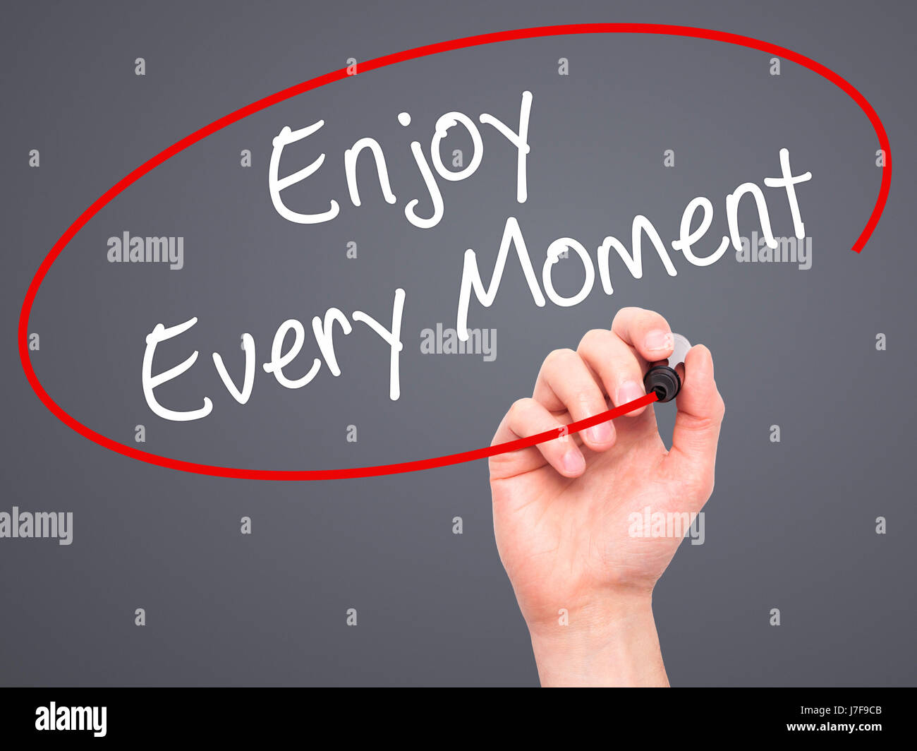 Man Hand Writing Enjoy Every Moment With Black Marker On Visual Man Hand Writing Enjoy Every Moment With Black Marker On Visual