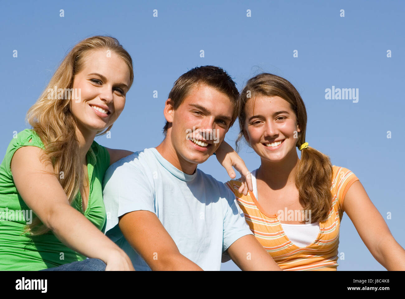 Threesome happy playful giggling laughing images