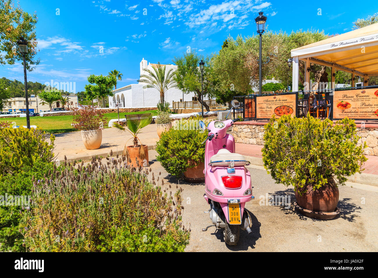 ibiza island, spain - may 18, 2017: classic pink vespa scooter ibiza island, spain - may 18, 2017: classic pink vespa scooter