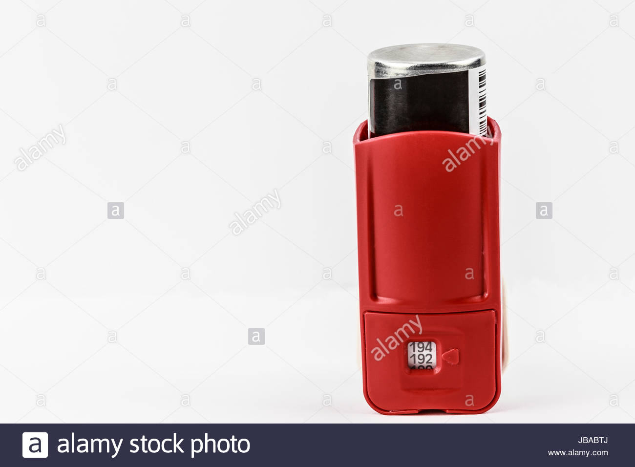 Back of red albuterol inhaler for asthma. Dosage number count Stock