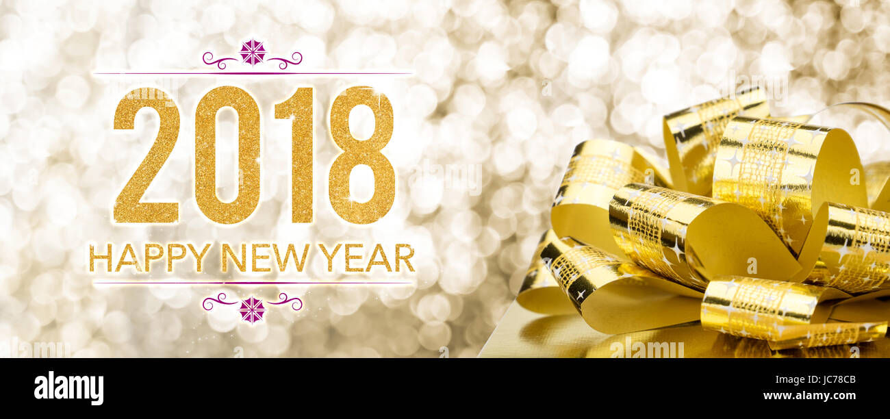 Happy New Year 2018 With Golden Gift Box With Big Bow At Sparkling