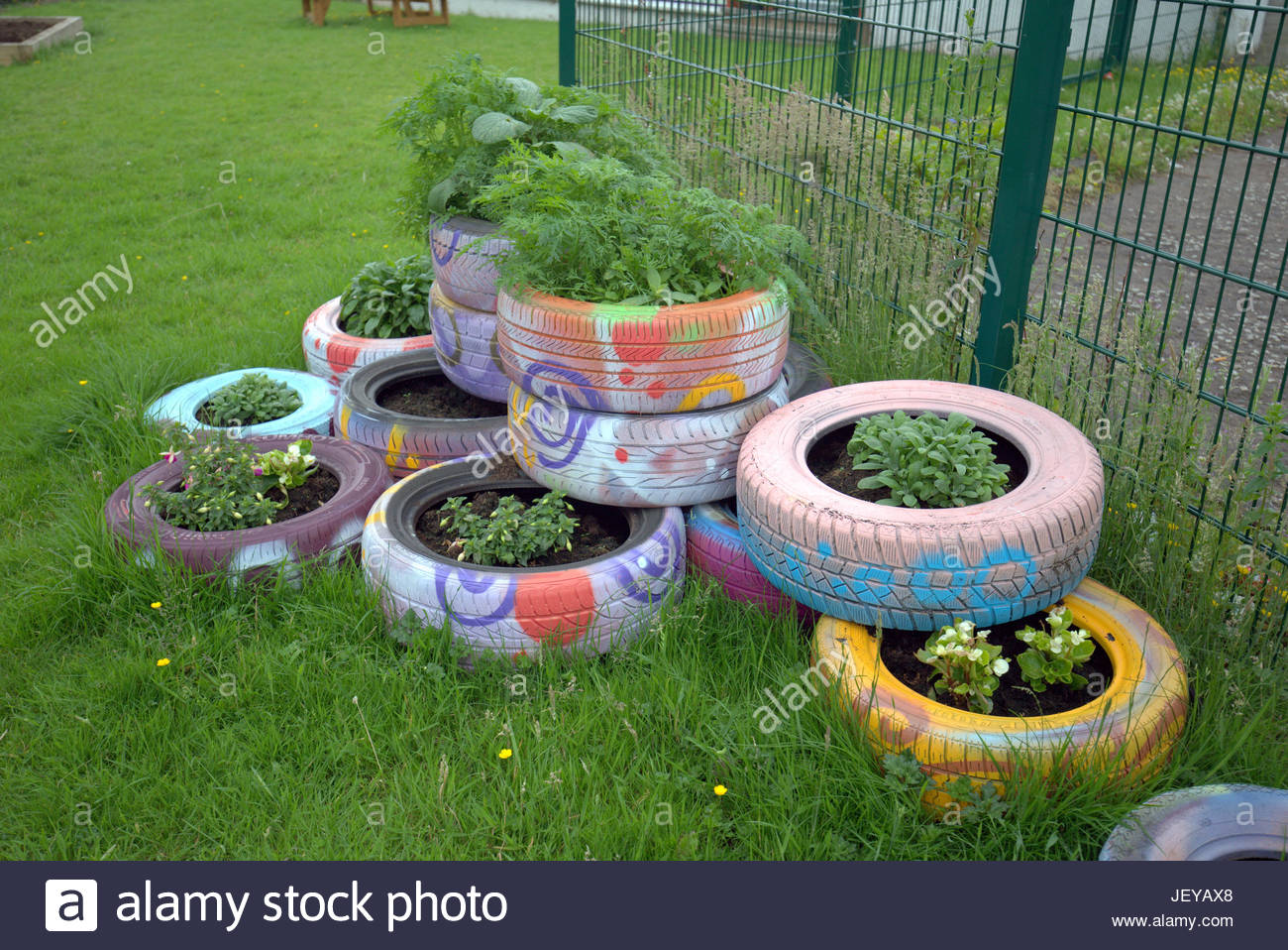 recycled tires tyres used as plant pots upcycling ideas how to use everyday objects as design features in a garden - Garden Ideas Using Tyres recycled tires tyres used as plant pots upcycling ideas how to use everyday objects as design features in a garden - Garden Ideas Using Tyres