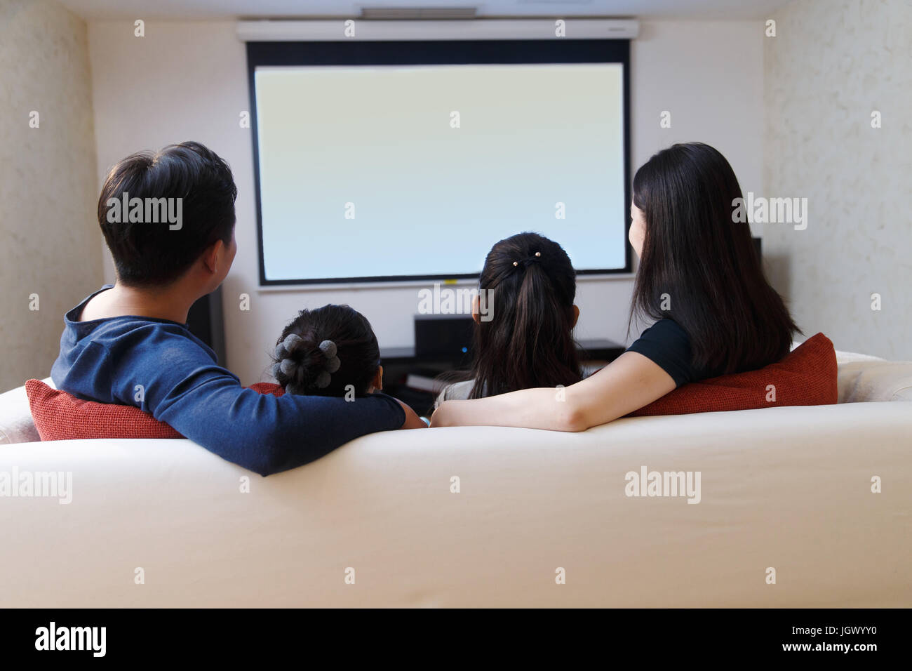 Happy family watching TV in sofa,back view Stock Photo, Royalty Happy family watching TV in sofa,back view Stock Photo, Royalty