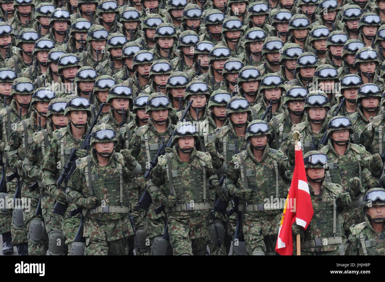 Japanese Self-Defense Force soldiers march in formation during the