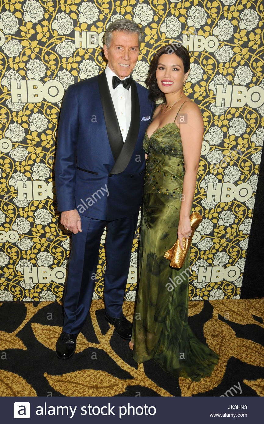 Michael Buffer and Christine Buffer. Arrivals at the HBO 2016 Golden