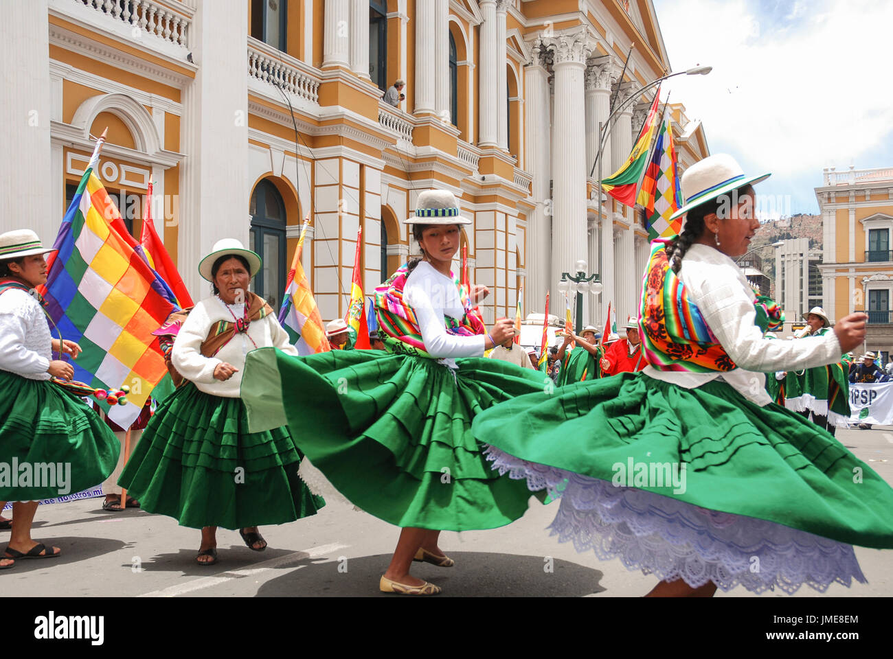Bolivian People In Colorful Traditional Costumes Celebrating The Stock