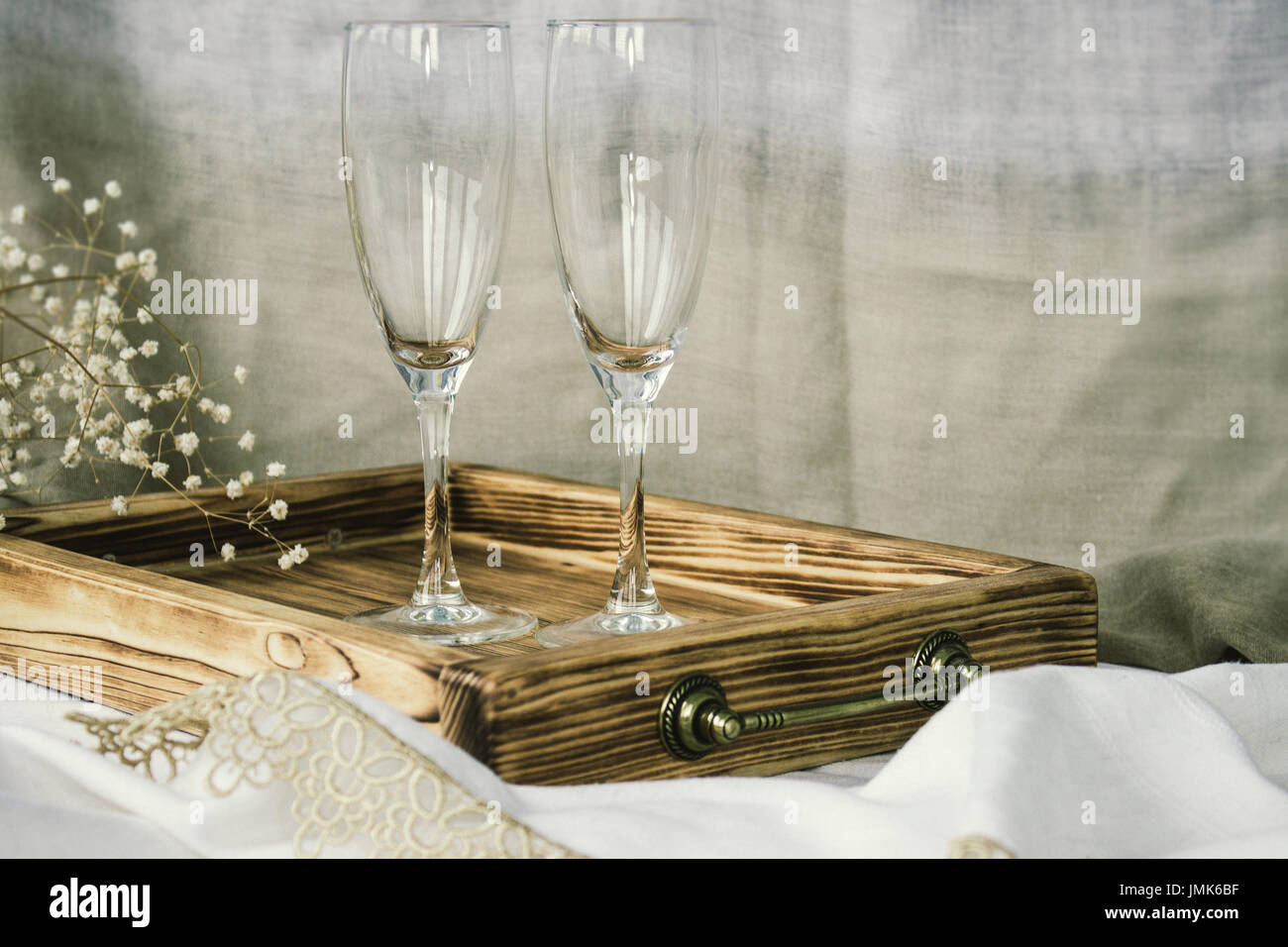 Pair Of Wine Glasses And Wooden Tray Champagne Flutes On The Wedding Table Mockup Vintage Rustic Style Pair Of Wine Glasses And Wooden Tray Champagne Flutes On The Wedding Table Mockup Vintage Rustic Style