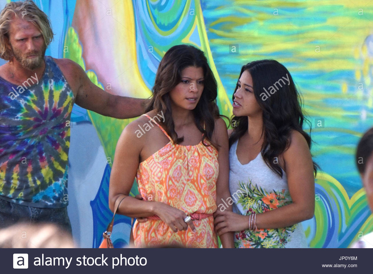 Gina Rodriguez, Jenna Ortega. Gina Rodriguez flexes her muscles on