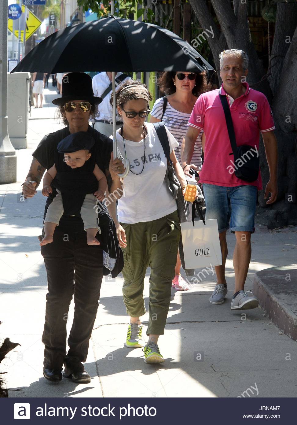 Sara Gilbert, Linda Perry and Rhodes Emilio Gilbert Perry. Sara Stock