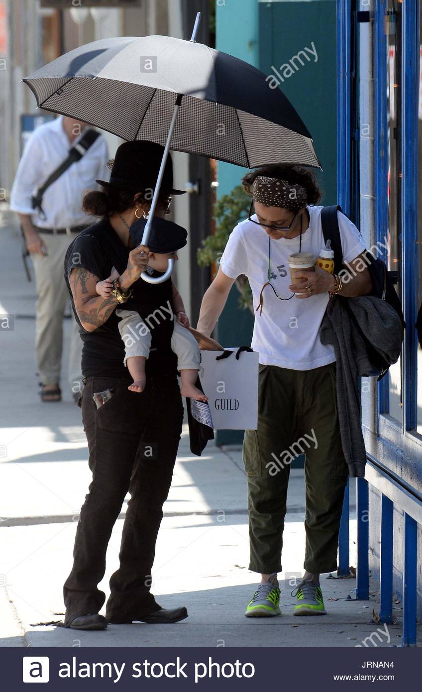 Sara Gilbert, Linda Perry and Rhodes Emilio Gilbert Perry. Sara Stock
