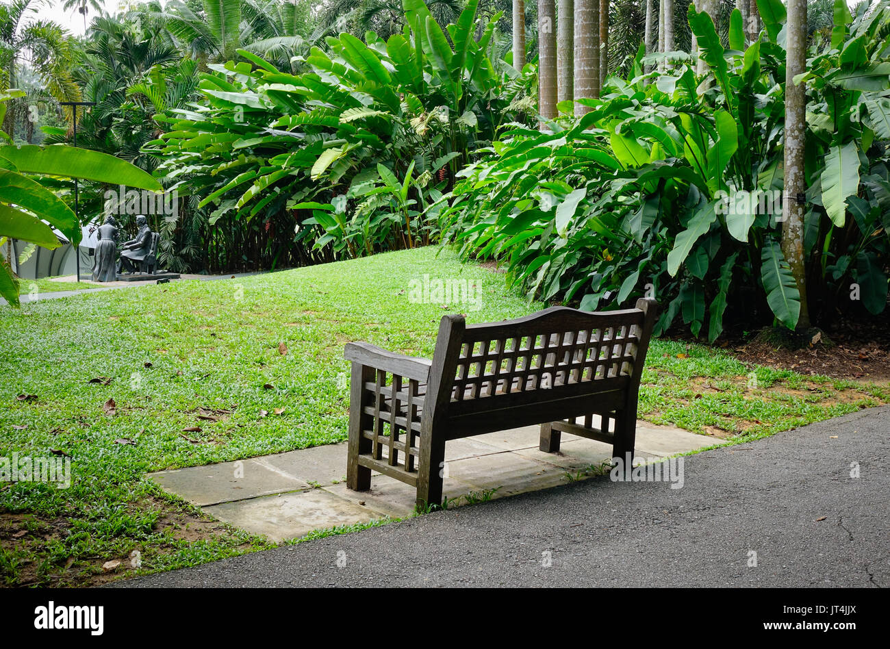 A wooden bench at botanic garden in Singapore. Singapore, referred to