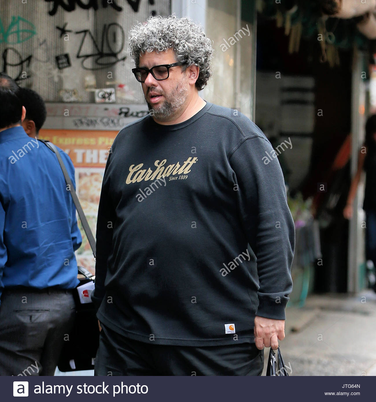 Neil LaBute. Playwright Neil LaBute walks in the Theater District in