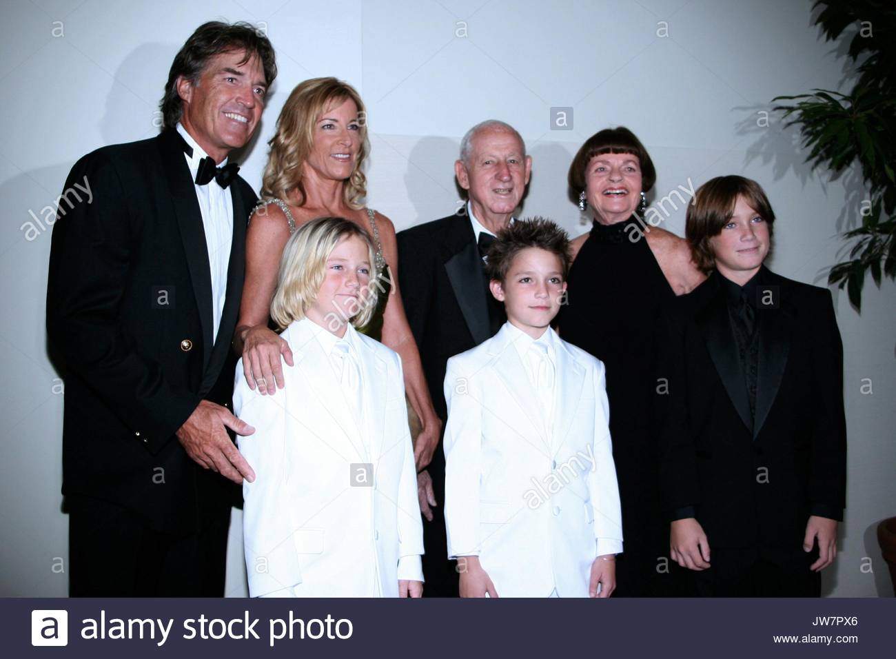Andy Mill, Chris Evert and family. Greg and Laura Norman - Chris Stock