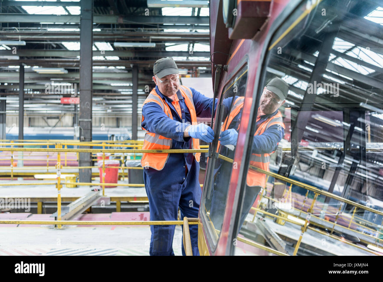 Engineer inspecting in train works Stock Photo 154117744