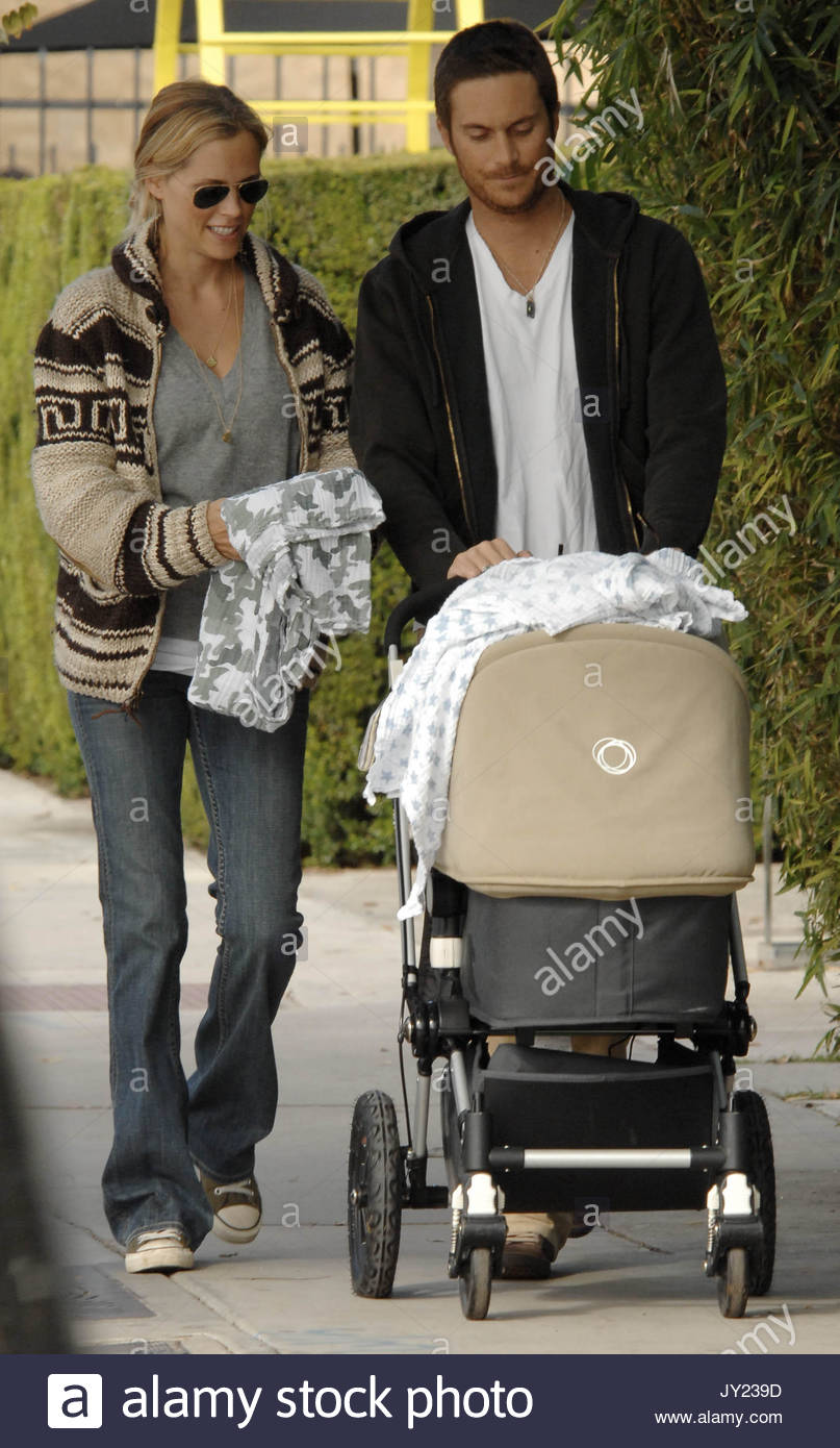 Oliver Hudson, wife Erin, and son. Oliver Hudson and wife Erin out