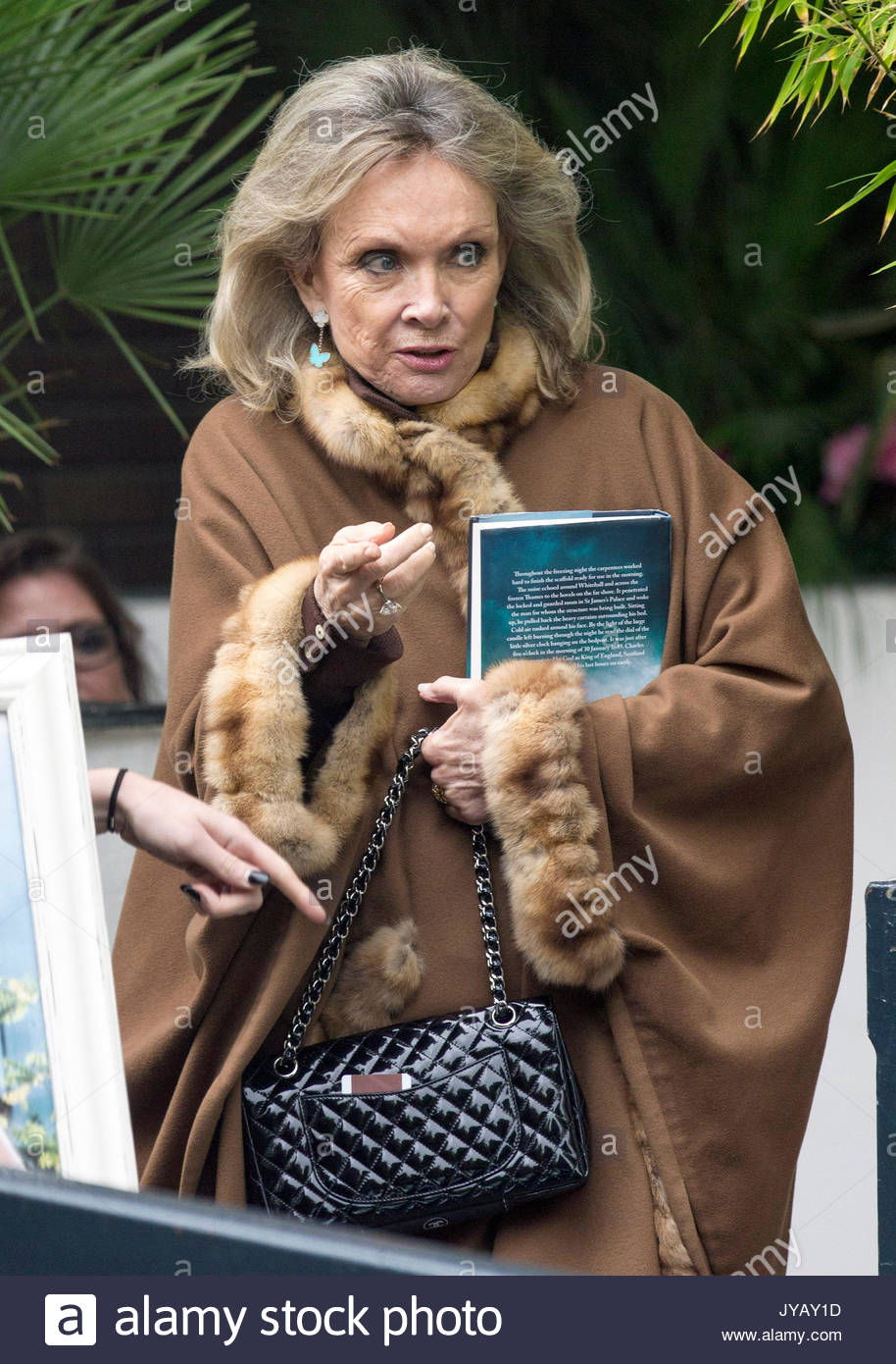 Christina Tholstrup. Veteran actor Sir Roger Moore is pictured Stock