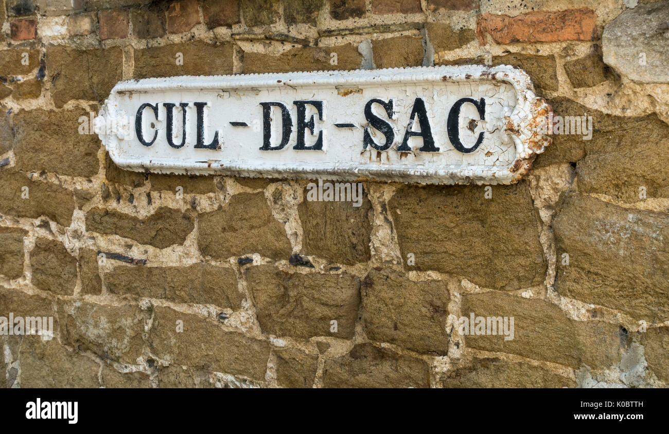 CulDeSac sign on stone wall Stock Photo, Royalty Free Image