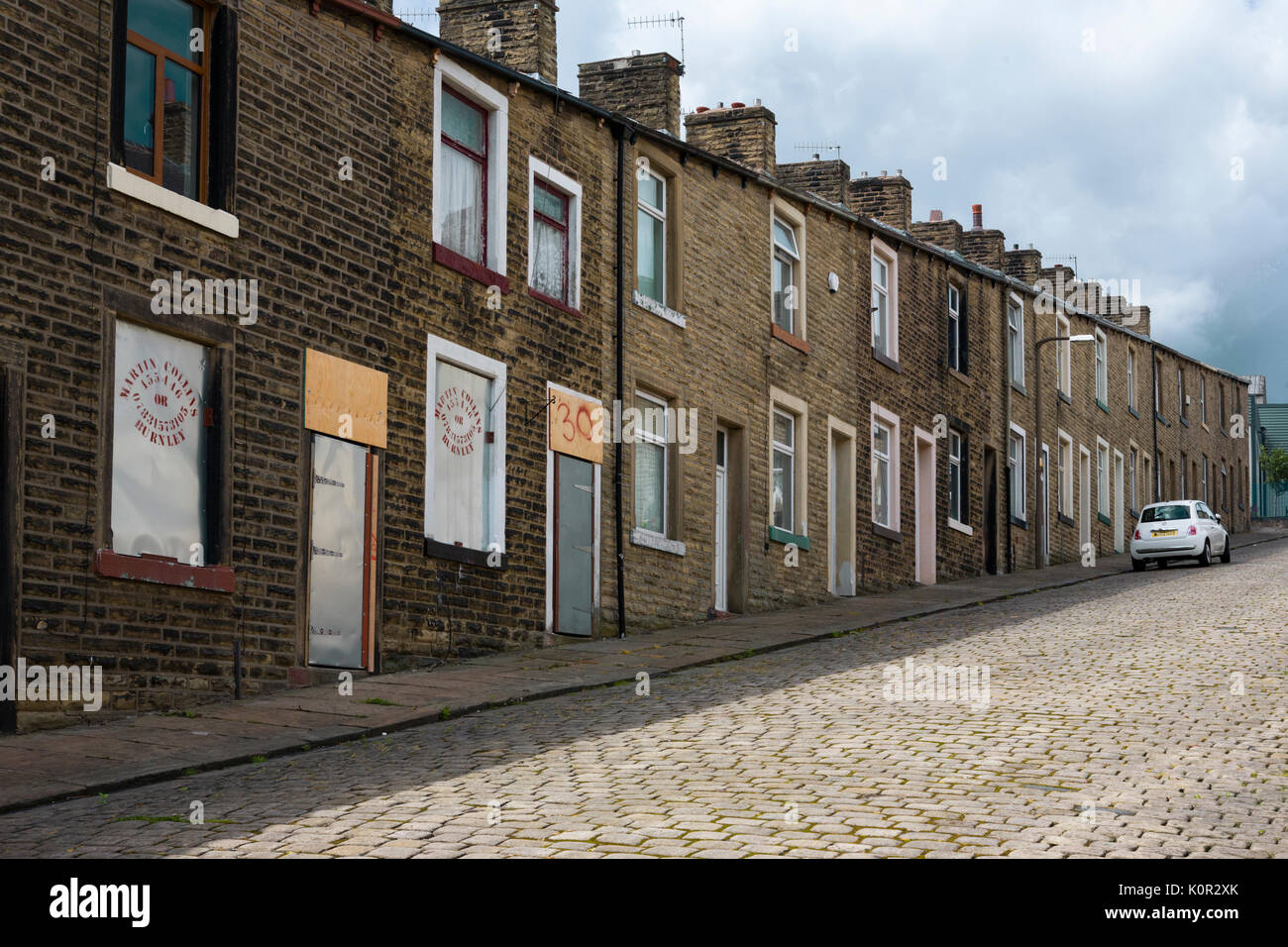 Basil Street, Colne, Lancashire, England, UK steep cobbled street of