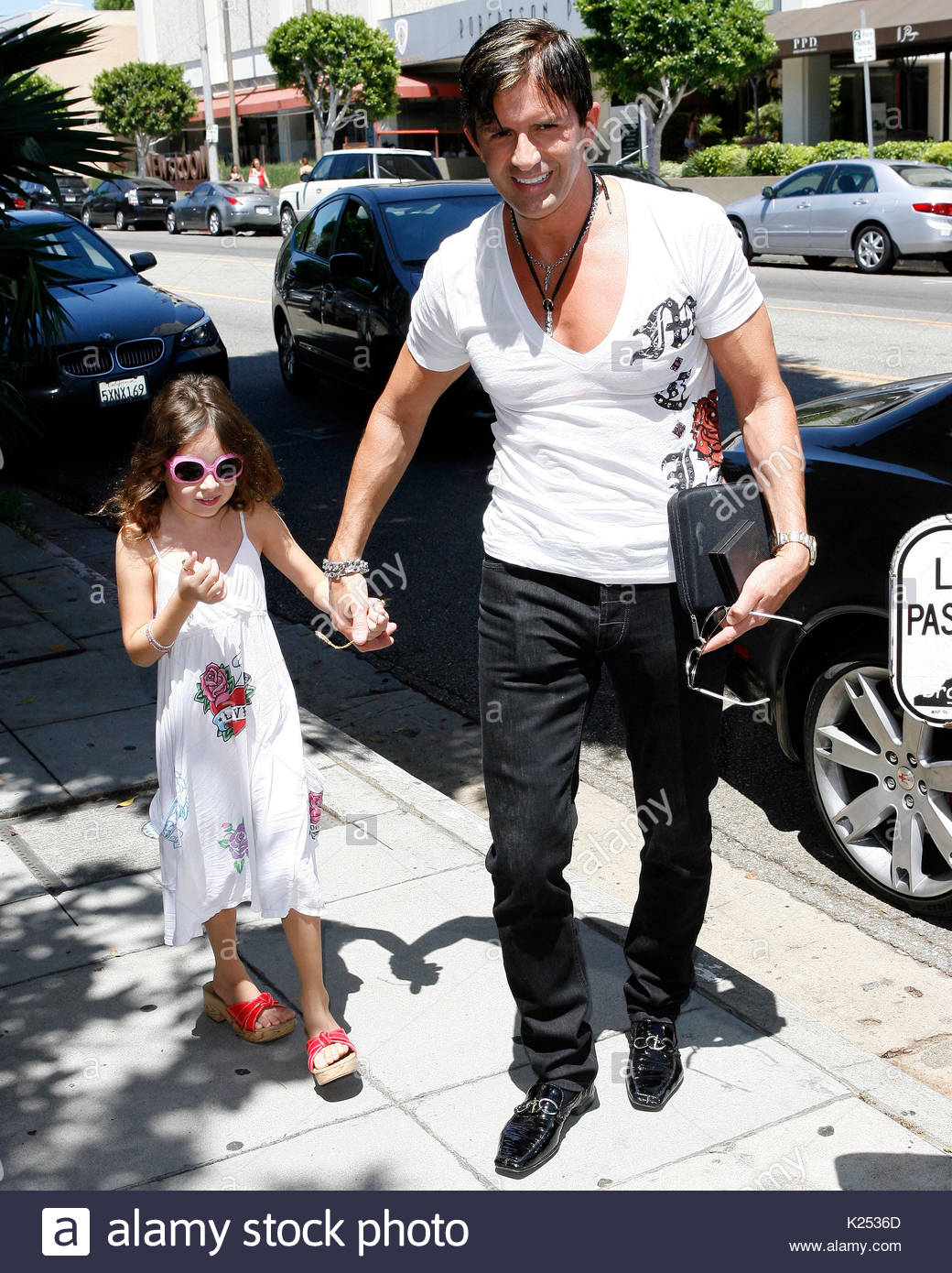 Robert Rey and Sydney Rey. TV plastic surgeon, Dr. 90210 (Robert Stock