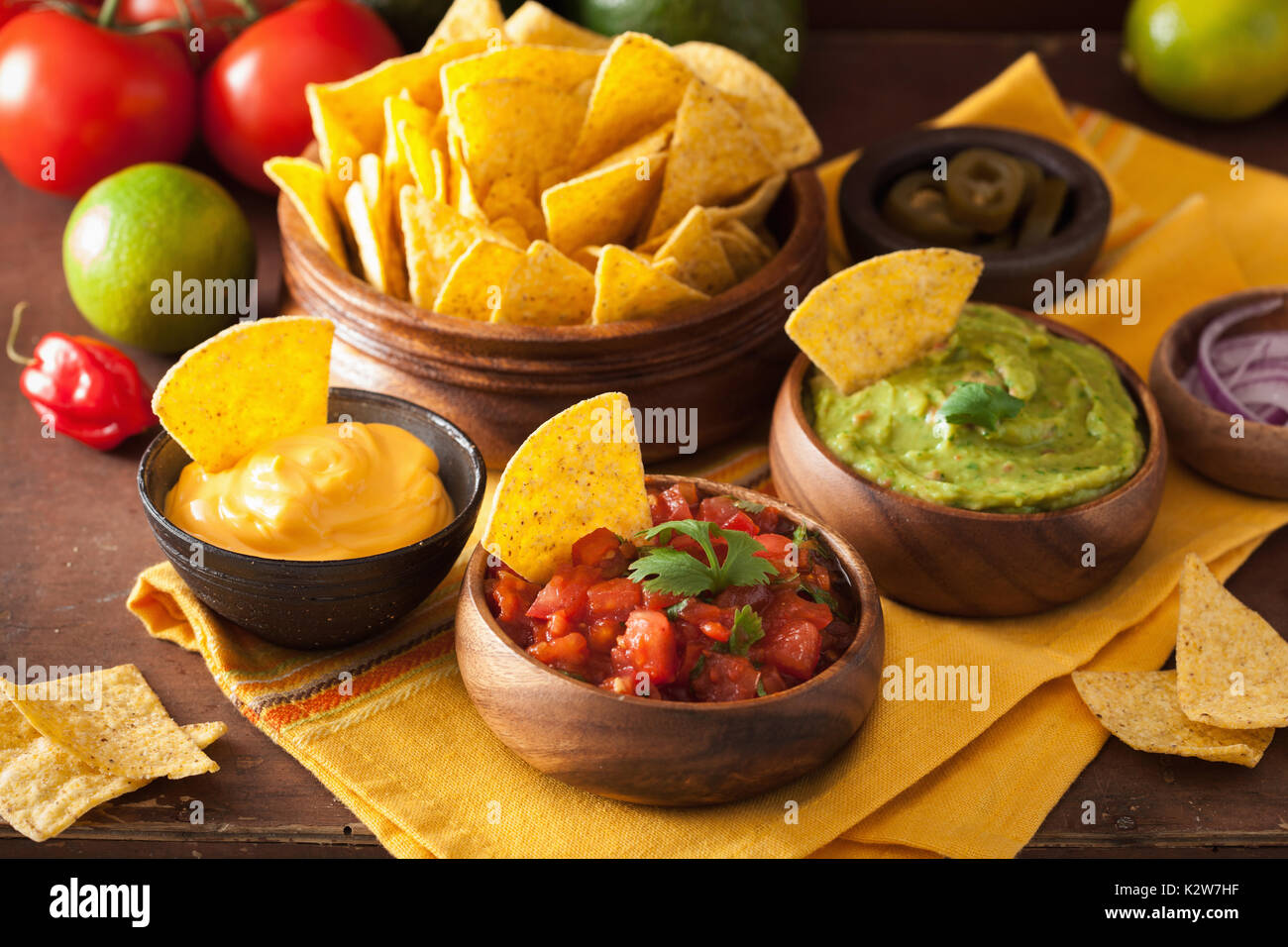 mexican nachos with guacamole, salsa and cheese dip Stock Photo