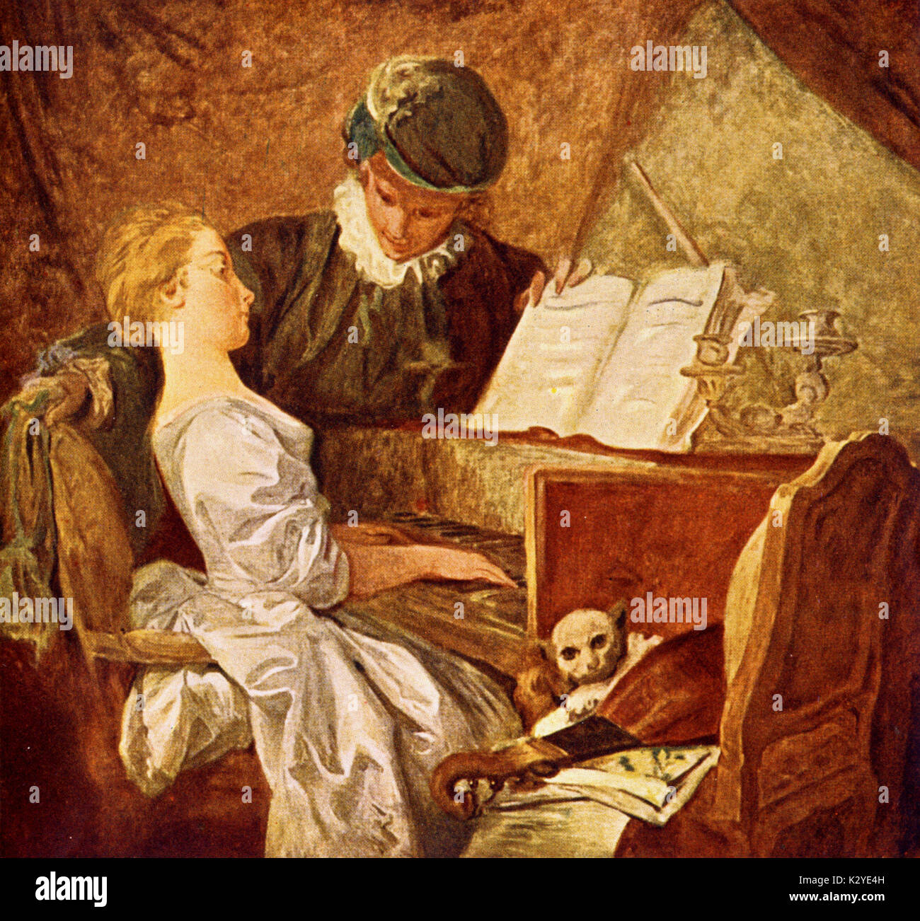 'The Music Lesson' after painting by J H Fragonard (1732-1806) showing girl playing harpsichord. Teacher standing by. MANDOLIN on nearby chair.