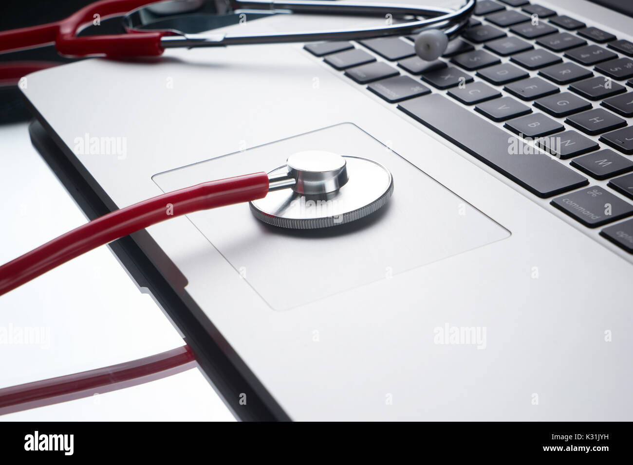 Laptop Diagnosis With A Stethoscope Computer Repair And Service Concept Laptop Diagnosis With A Stethoscope Computer Repair And Service Concept