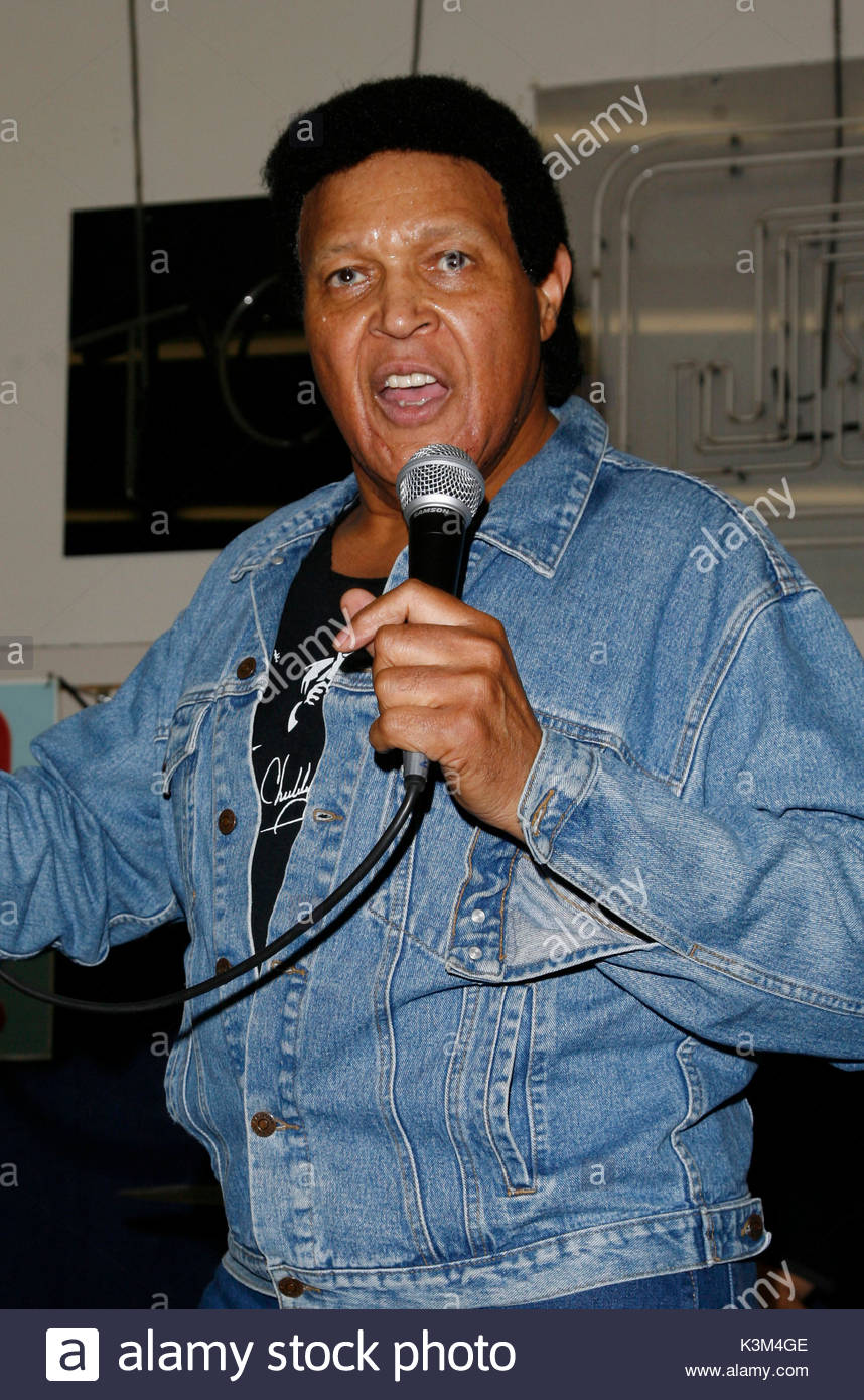 Redhead english pussy Chubby checker with a microphone