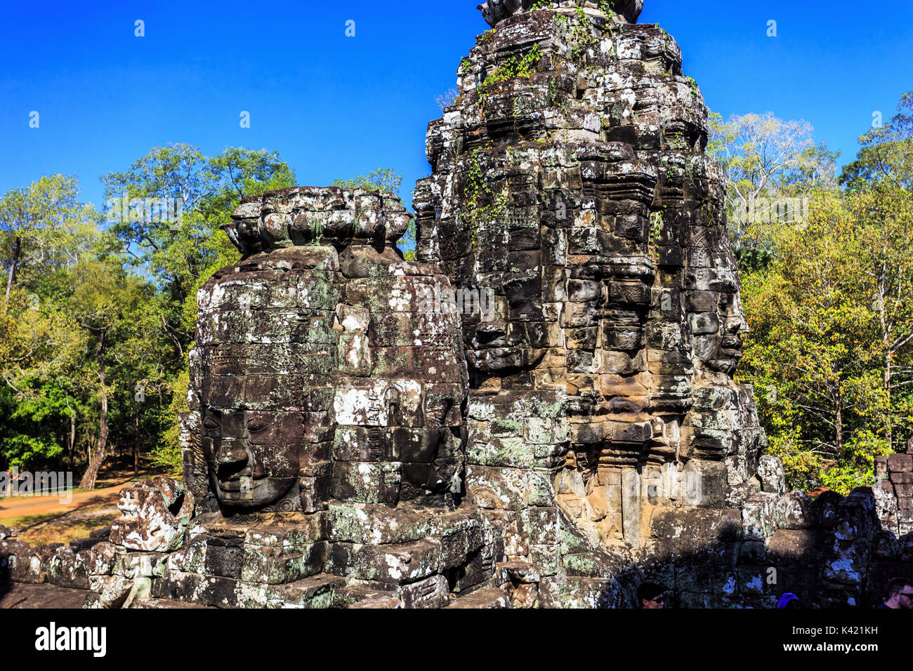 Giant Stone Faces Of Ancient Buddhist Khmer Bayon Temple In Angkor Thom