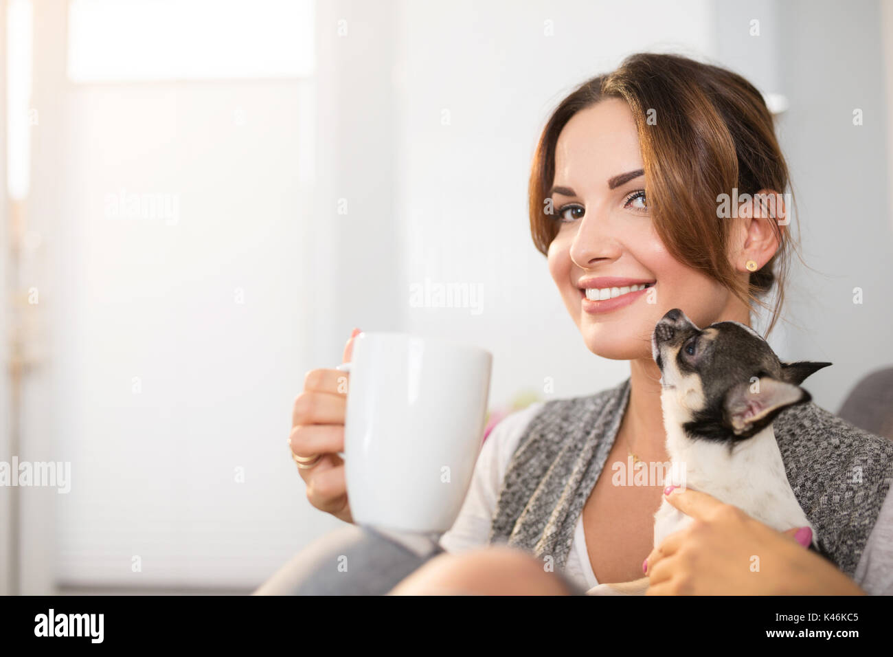 woman cuddle dog stock photos woman cuddle dog stock golden retriever christmas movie