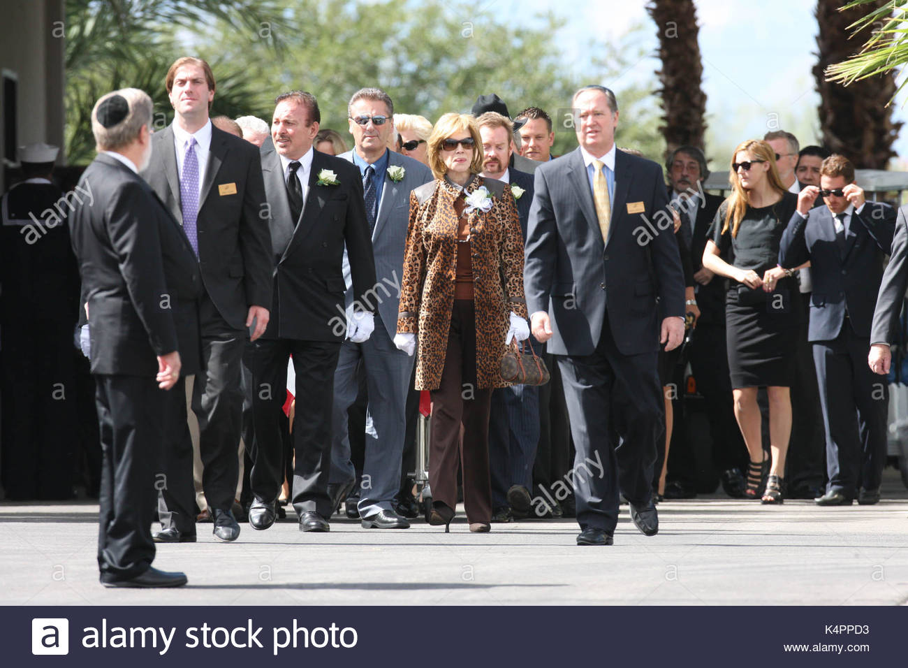 Tony Curtis' funeral. Jamie Lee Curtis stood near her sister, Kelly