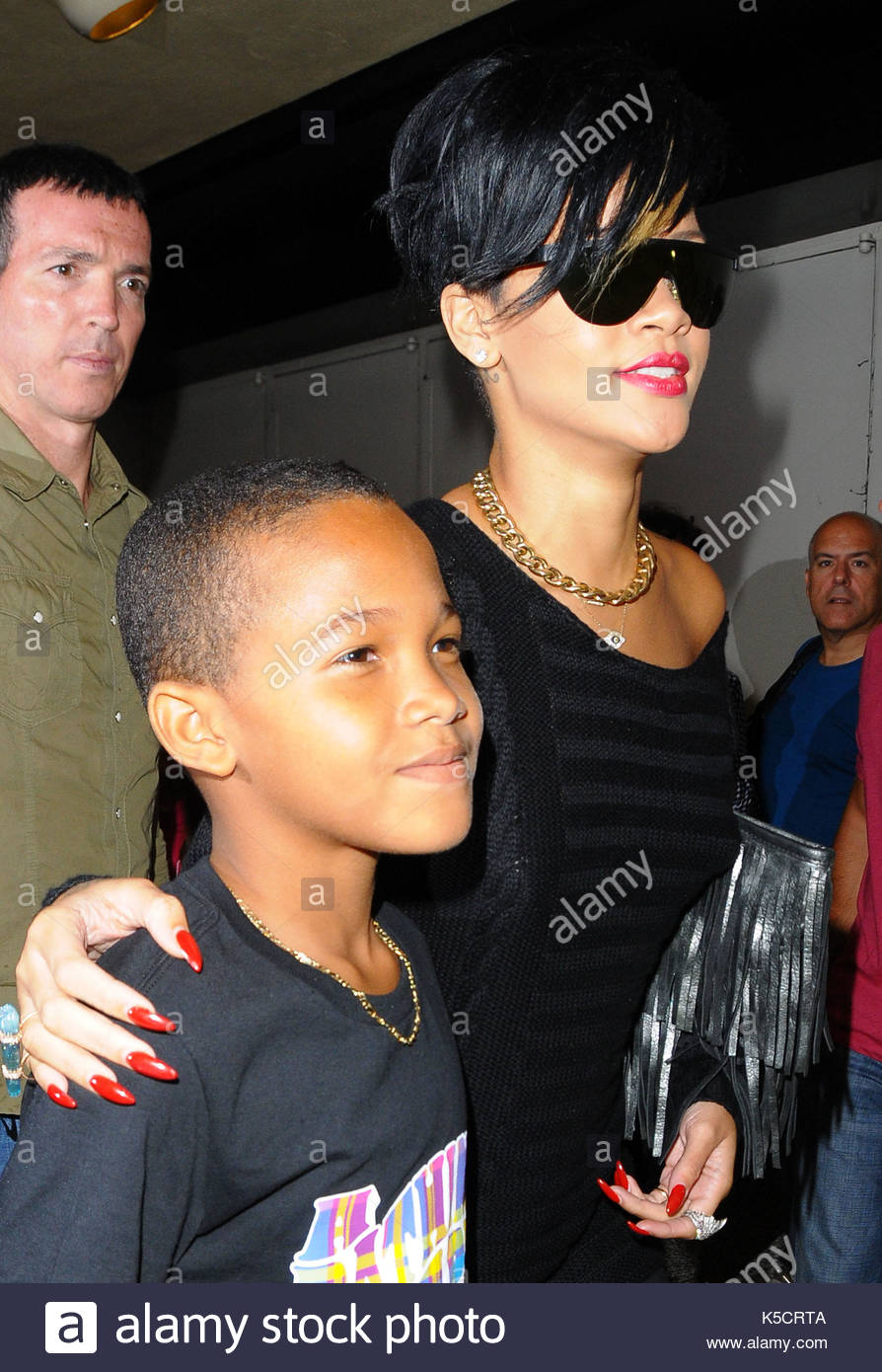 Rihanna, Rorrey Fenty and Rajad Fenty. Rihanna in complete shock Stock