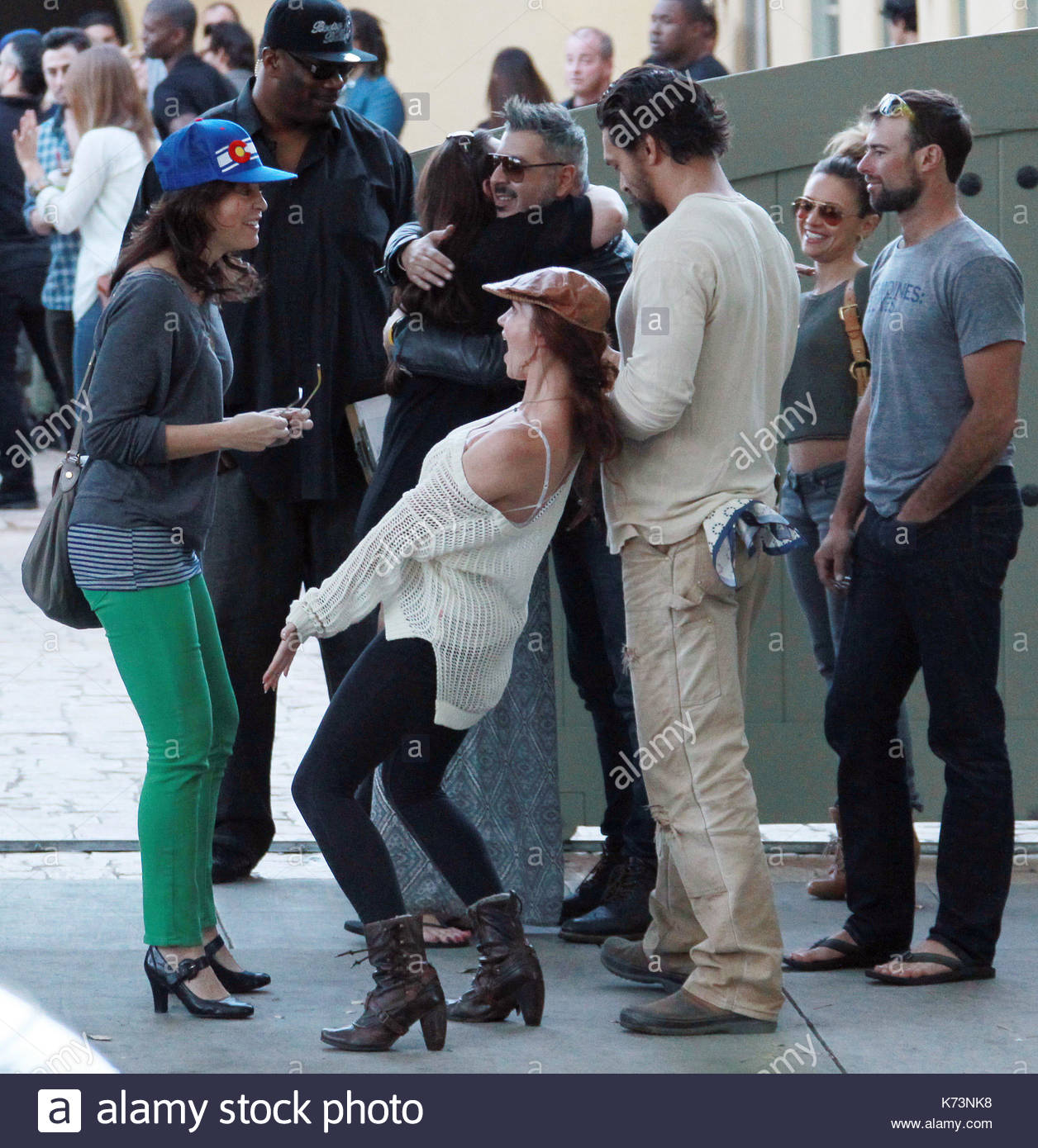 Jason Momoa. Jason Momoa gets a kiss from an unidentified female Stock Photo ...