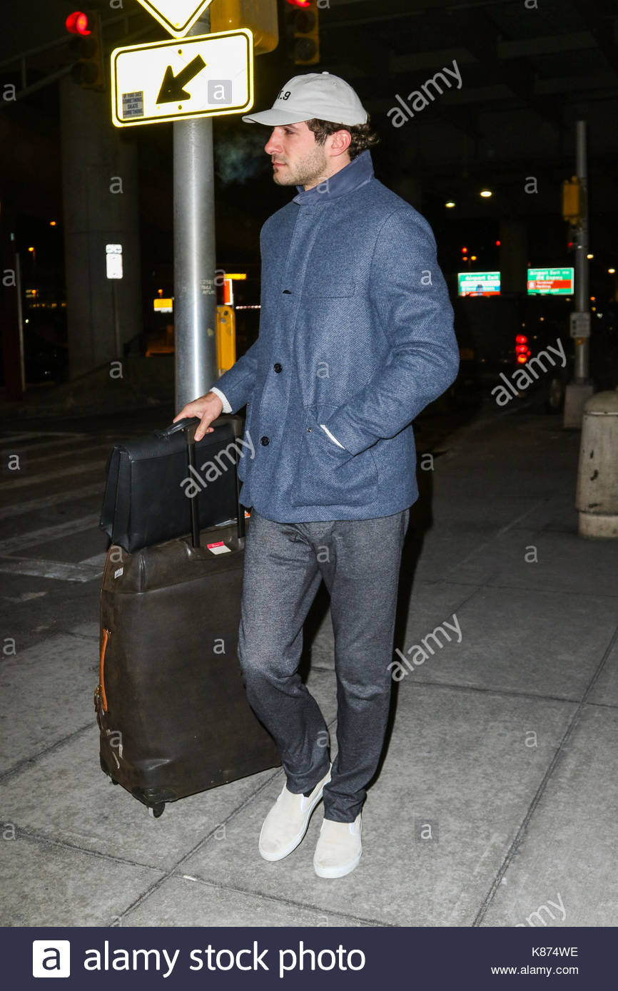 Stavros Niarchos III. Jessica Hart is spotted at JFK airport arriving