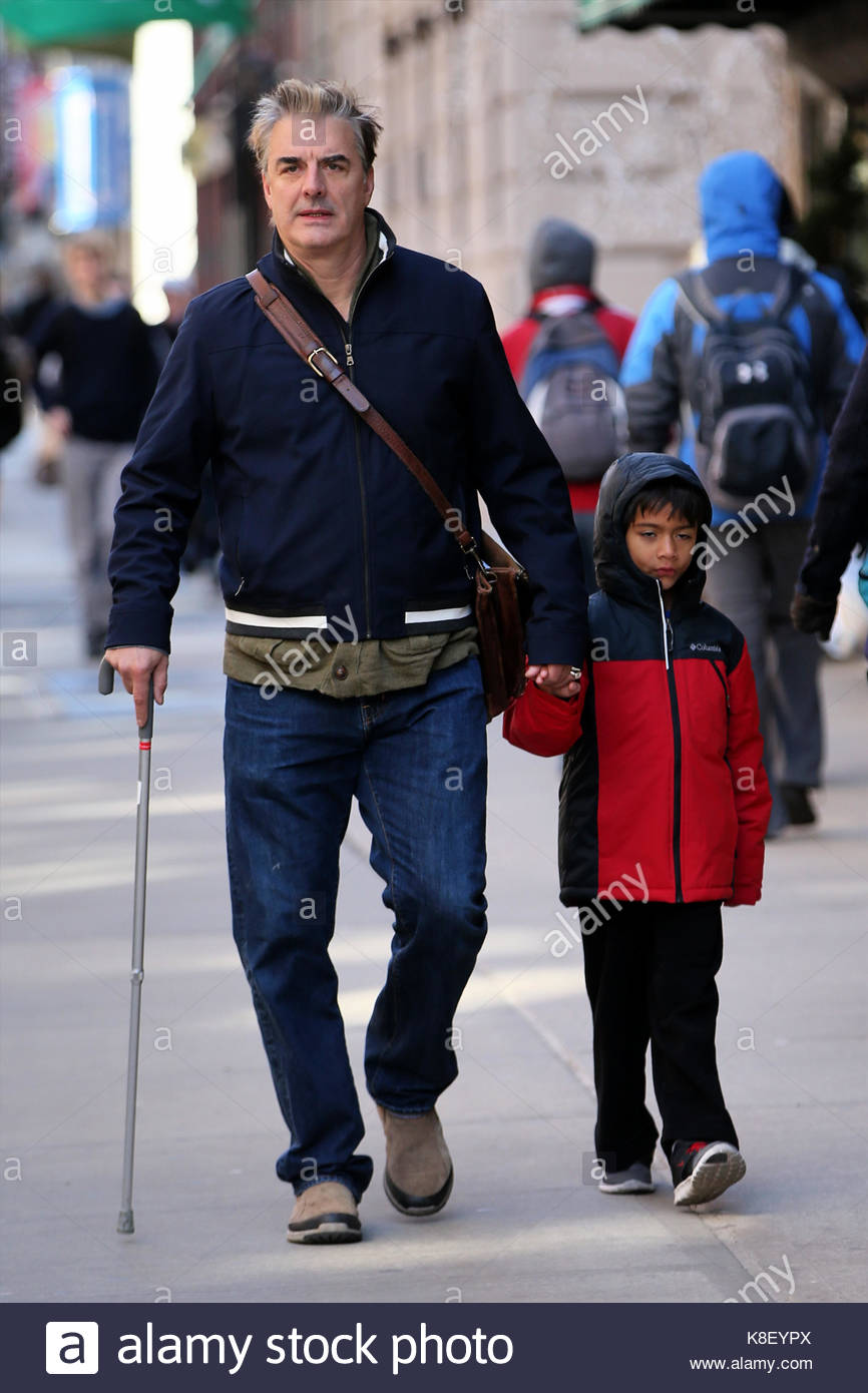 Chris Noth and Orion Noth. Actor Chris Noth, using a cane, walks home