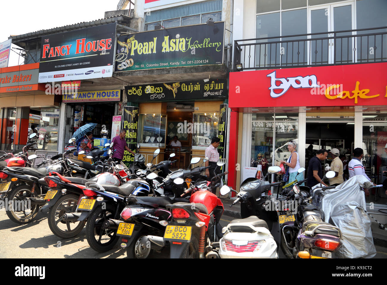 Kandy City Colombo Street Sri Lanka Motorcycles outside Cafe and Stock