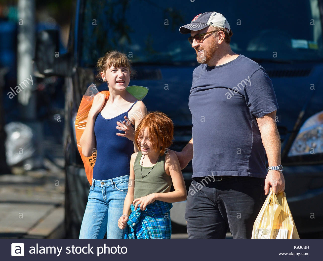 Louis C.K., Kitty Szekely and Mary Louise SzekelyComedian and actor Stock Photo, Royalty Free ...