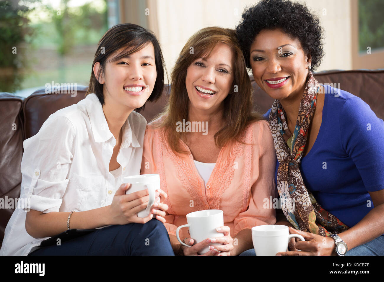 Diverse Group Of Women Talking And Laughing Stock Photo Alamy