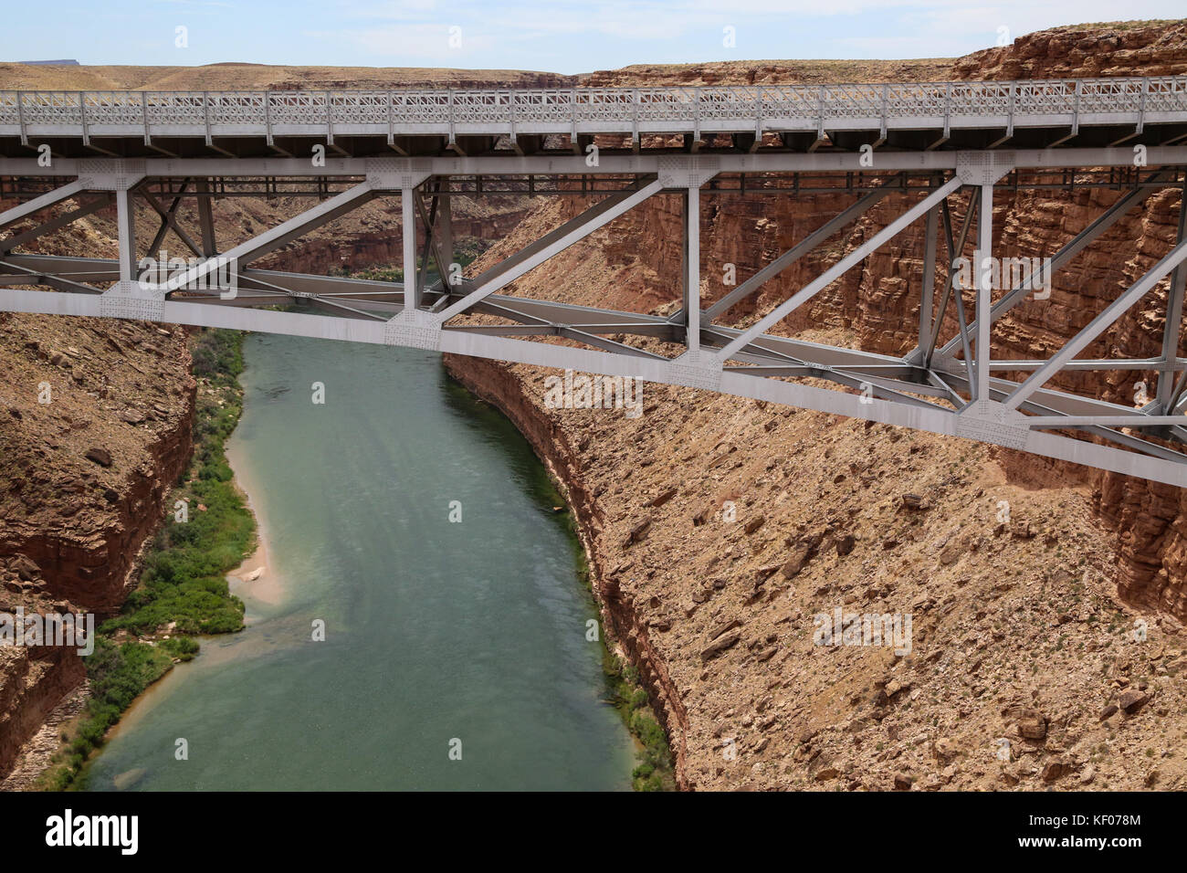 The Navajo Bridge Crosses The Colorado River At Marble Canyon AZ Stock