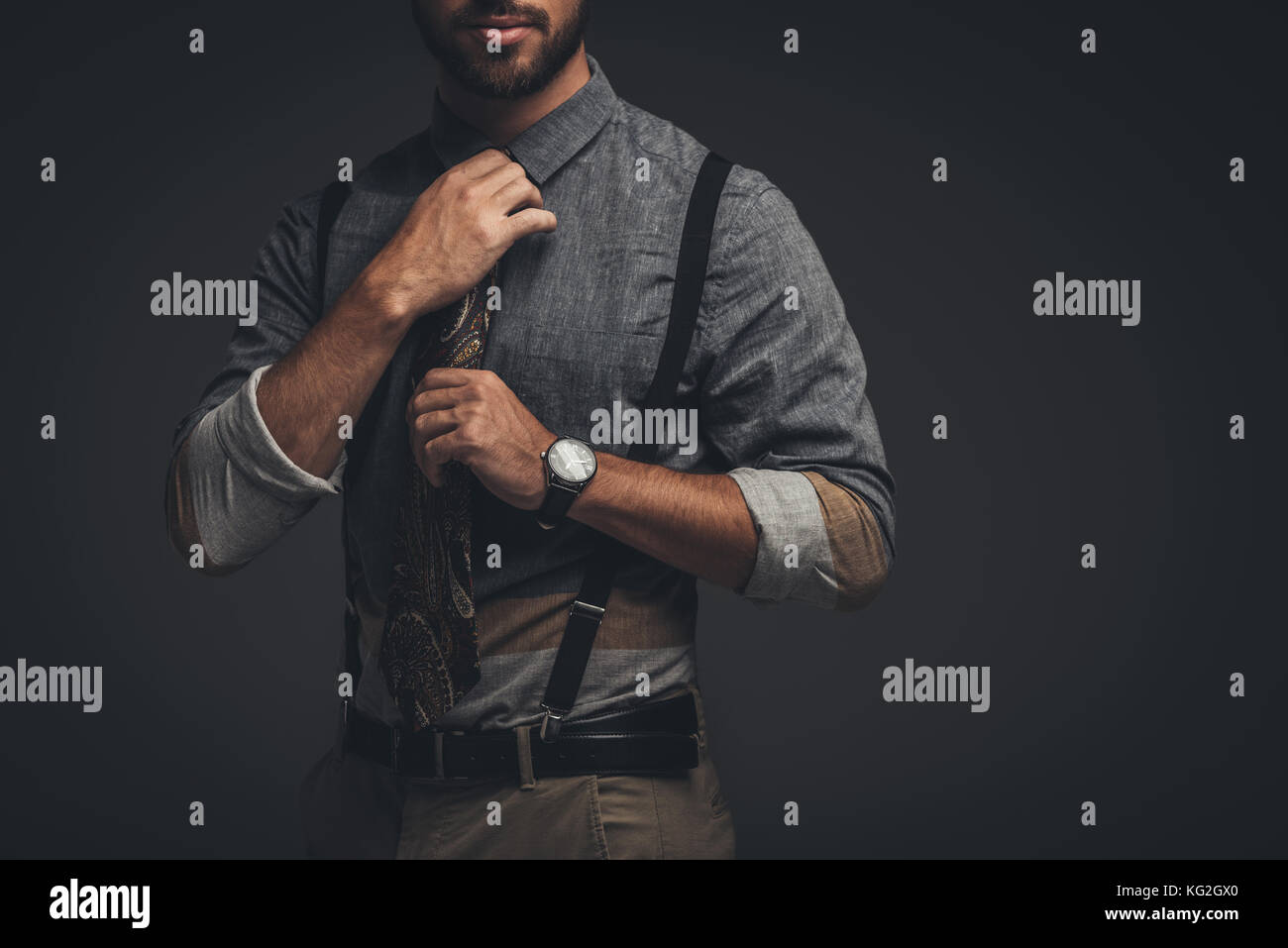 Man Straightening His Tie Hi Res Stock Photography And Images Alamy