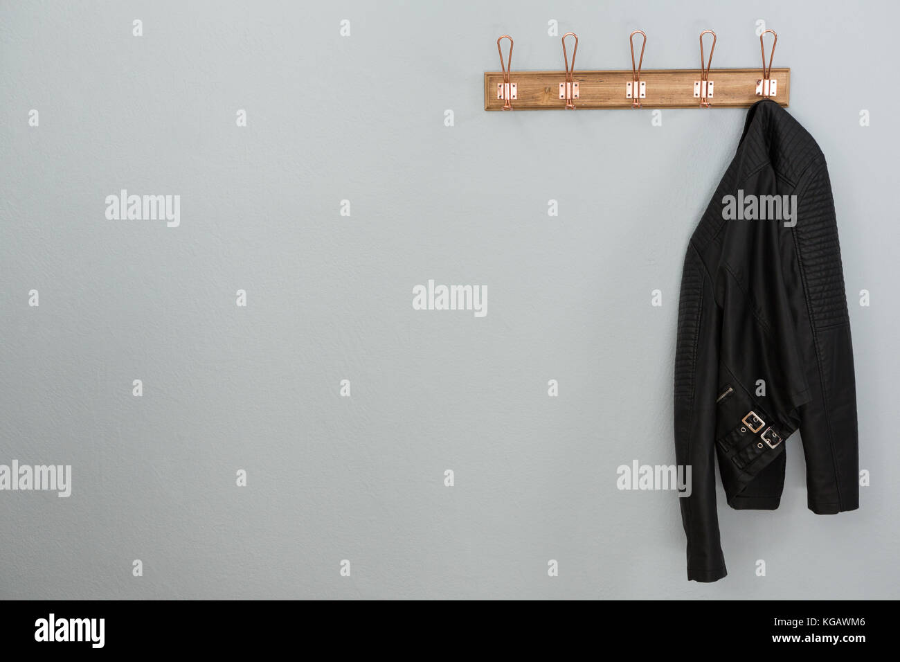 Black Leather Jacket Hanging On Stock Photos & Black Leather Jacket