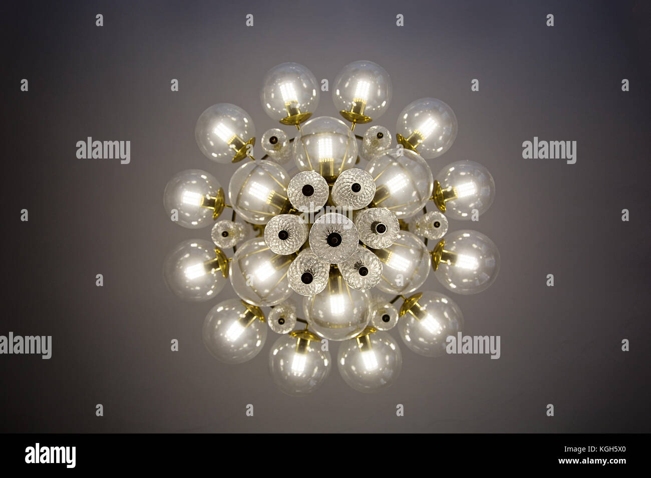 Crystal Glass Chandelier View From Bottom Round Shape Crystal Glass Chandelier View From Bottom Round Shape Bulb Covers Lit Energy Efficient Light Bulbs