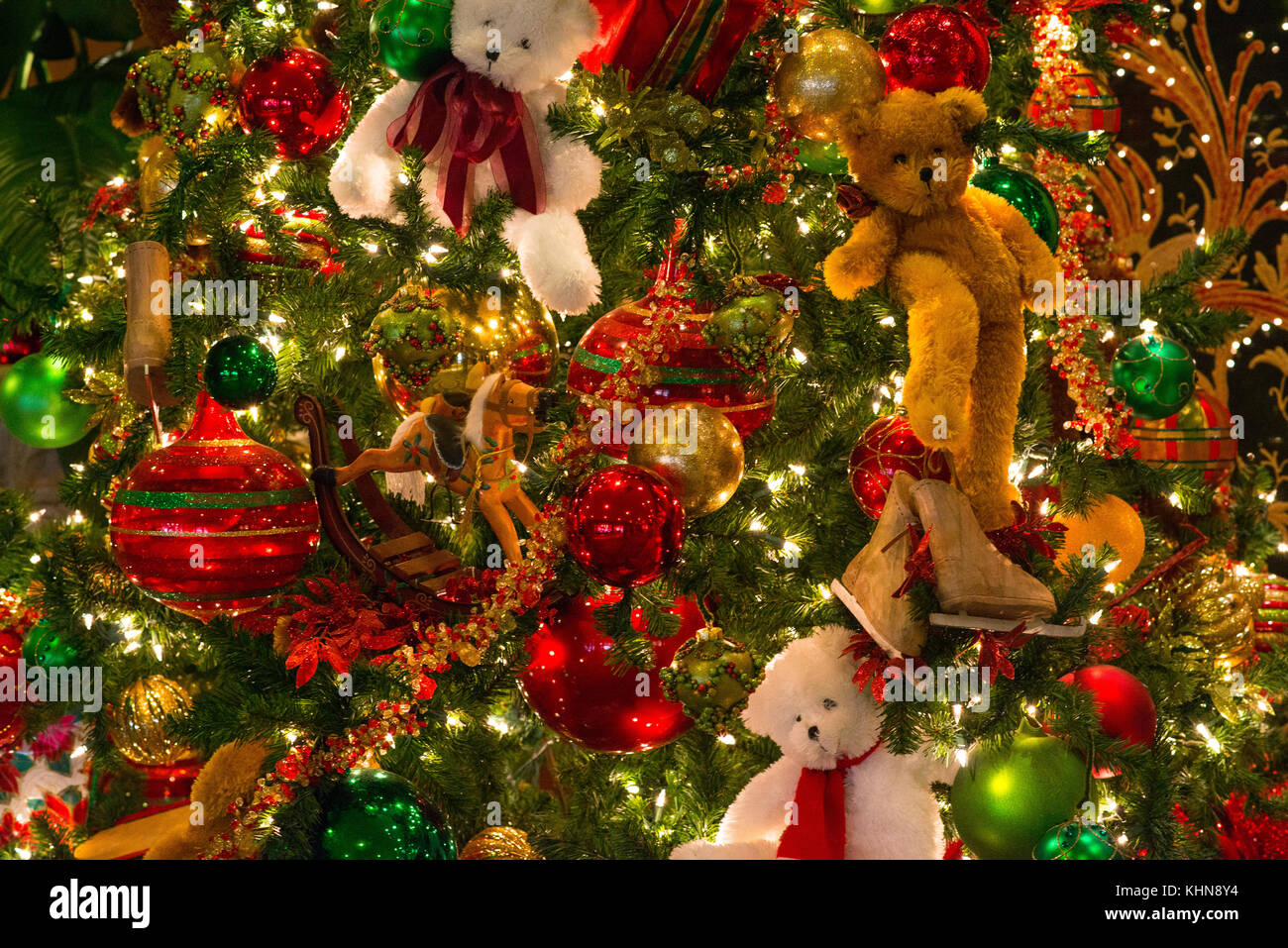 Christmas Texture Of Multi Colors Red Blue Green Golden Glitter Ornaments And Teddy Bears Placed Against The Backdrop Of Damask Pattern Wall Christmas Texture Of Multi Colors Red Blue Green Golden Glitter Ornaments And Teddy Bears Placed Against The Backdrop Of Damask Pattern Wall