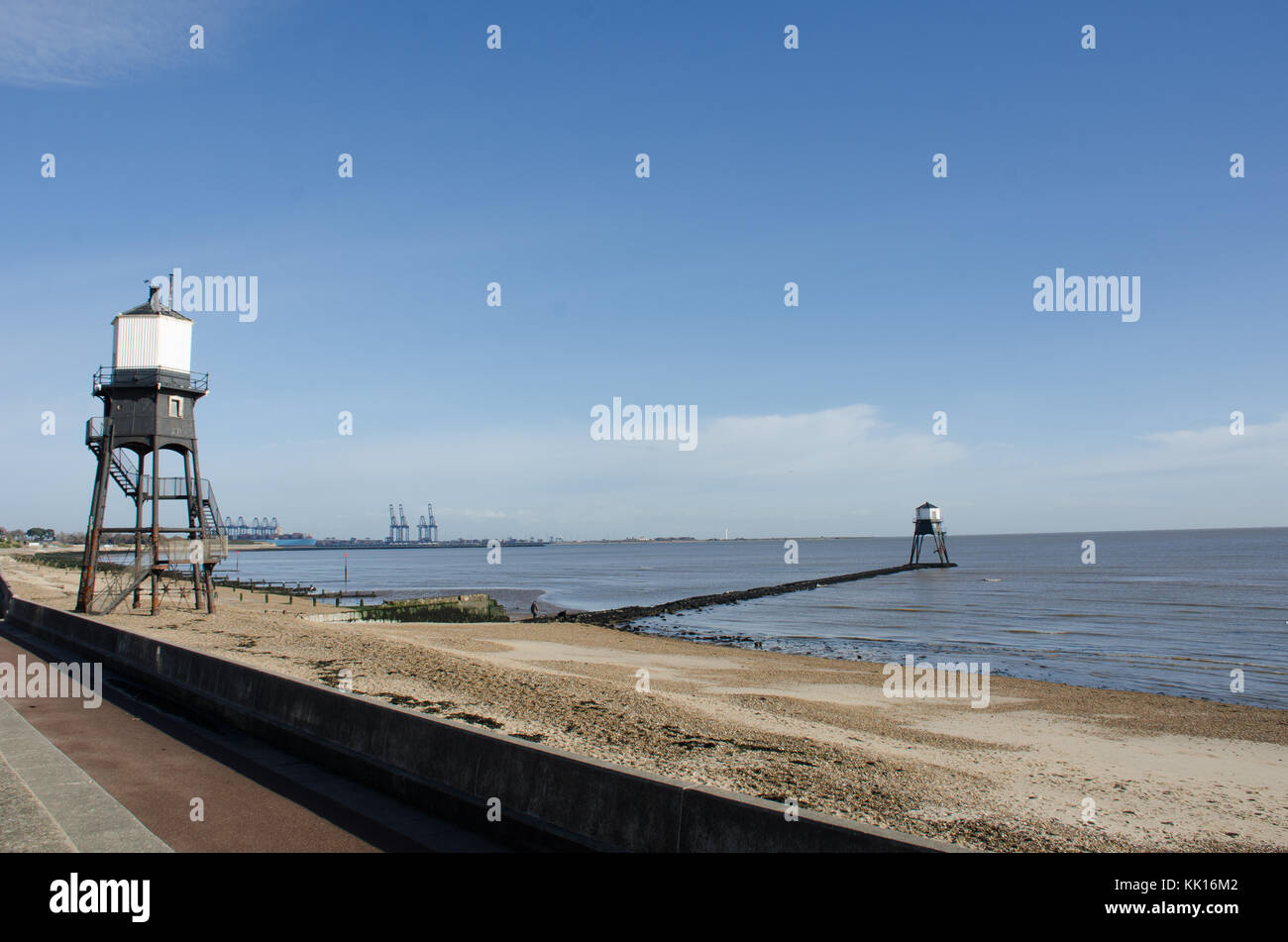 Dovercourt Lighthouses With Harwich In The Background Stock Photo