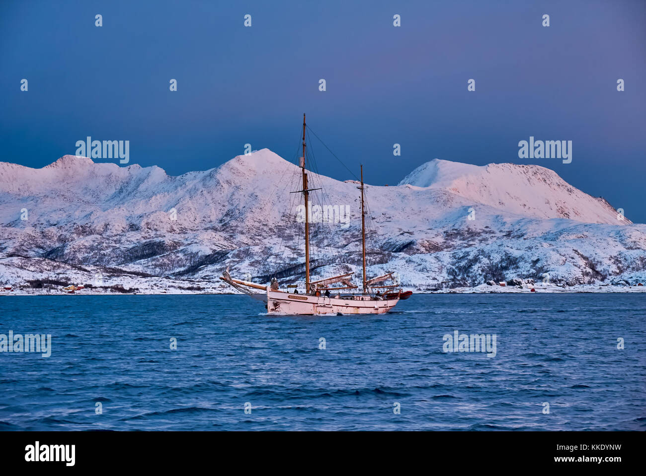 Sunrise Over Fjord With Snow Covered Mountains And Winter Landscape And