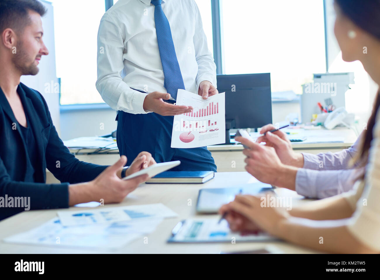 businessman presenting strategy plan in meeting stock photo presenting strategy