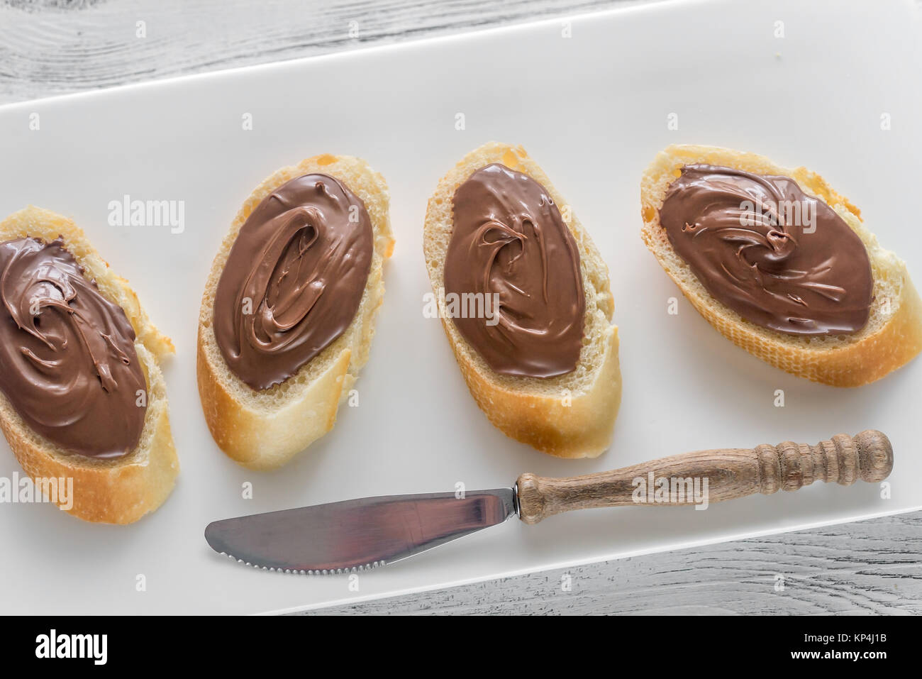 Slices Of Baguette With Chocolate Cream Stock Photo Alamy